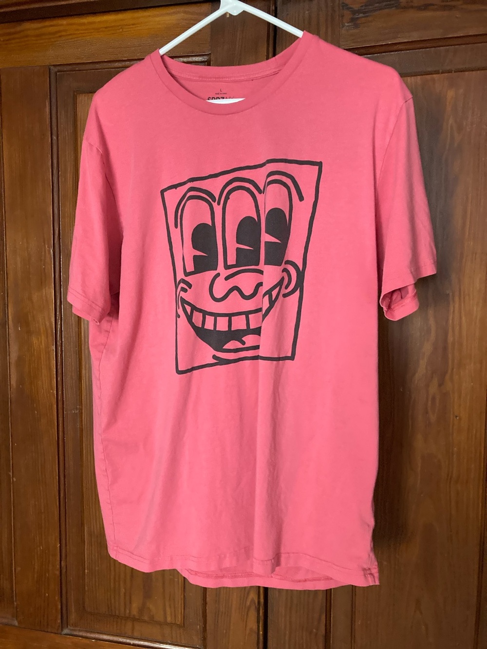 H&M Keith Haring Pink Short-Sleeve Graphic Tee with Black Face Print